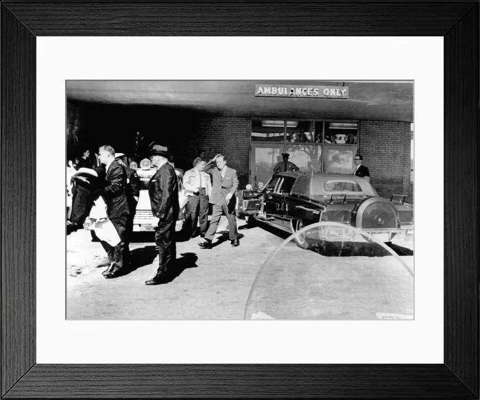 Framed Print : President John Kennedy's limousine at Parkland Hospital. Secret Serviceman quickly covered the open convertible in which Kennedy and Governor Connally were shot Framed Print : President John Kennedy's limousine at Parkland Hospital. Secret Serviceman quickly covered the open convertible in which Kennedy and Governor Connally were shot
