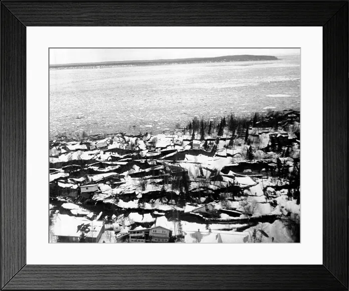 Framed Print : 1964 Alaska Earthquake. Aerial view of the Anchorage residential area of Turnagail shows destruction caused by the up thrust of the Good Friday earthquake Framed Print : 1964 Alaska Earthquake. Aerial view of the Anchorage residential area of Turnagail shows destruction caused by the up thrust of the Good Friday earthquake