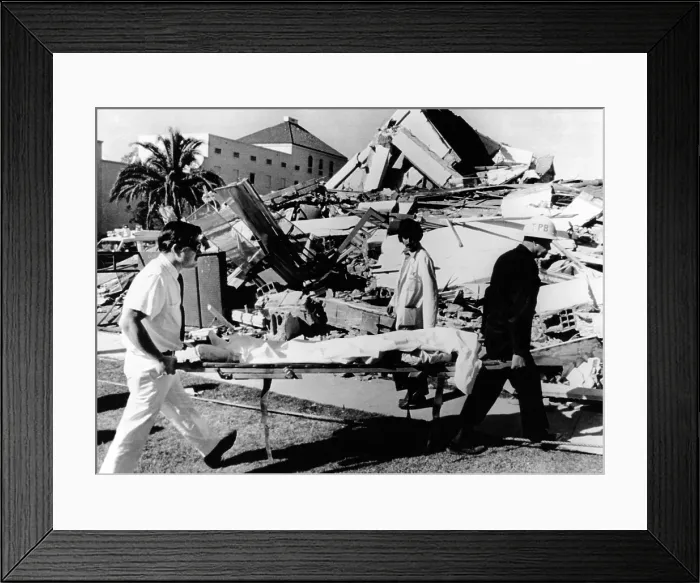 Framed Print : 1971 San Fernando Earthquake. An injured patient from the leveled Veteran's Hospital is evacuated. At least 26 persons were killed, 11 of them at this hospital. Feb. 9, 1971