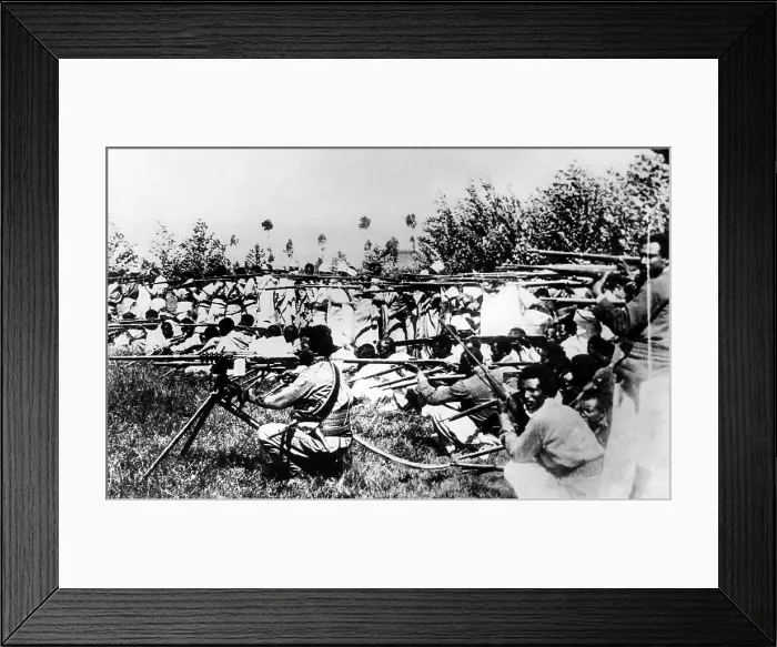 Framed Print : Second Italo-Ethiopian War. Ethiopian army holds training maneuvers. The dark-skinned, warriors of the Abyssinia, are armed with antique French guns. Jan. 1935