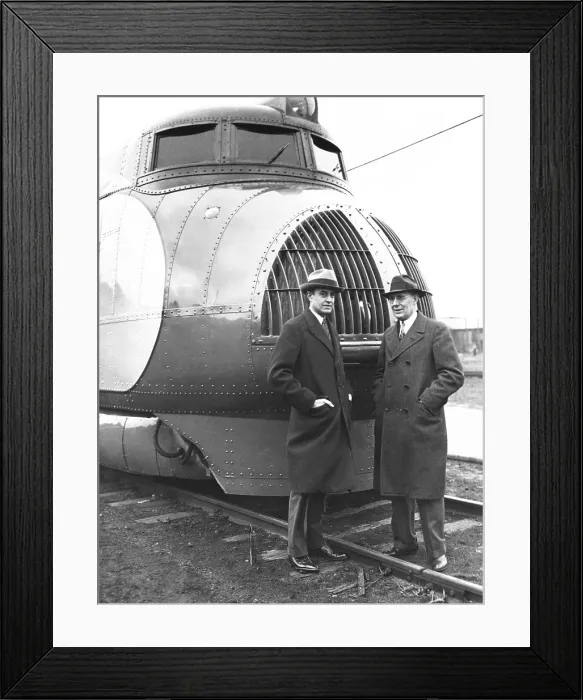 Framed Print : Averill Harriman and Charles Kettering next to the new Union Pacific 120 mile an hour train. Feb.12, 1934