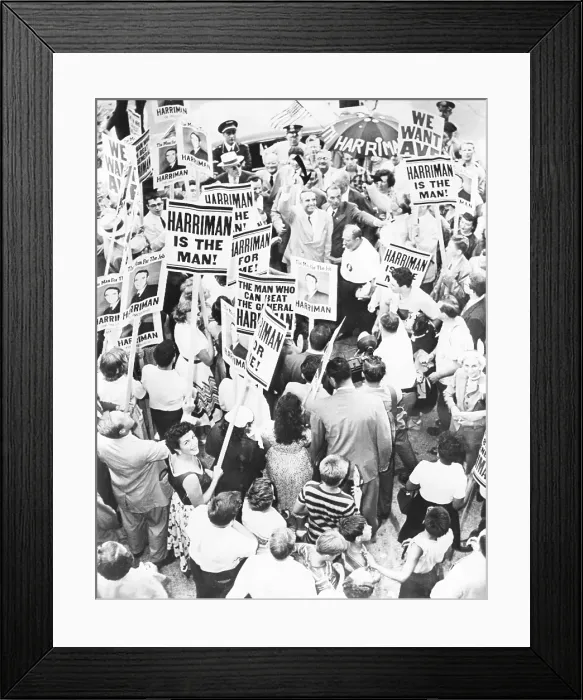 Framed Print : Democratic Presidential hopeful, Averill Harriman waves to crowd, in Chicago, July 17, 1952. The New York Delegation greets him with signs