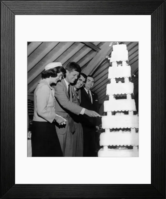 Framed Print : Senator John Kennedy cutting an multi-tier cake on his 39th birthday. He was honored with a testimonial dinner given by the cities of New Bedford and Fall River