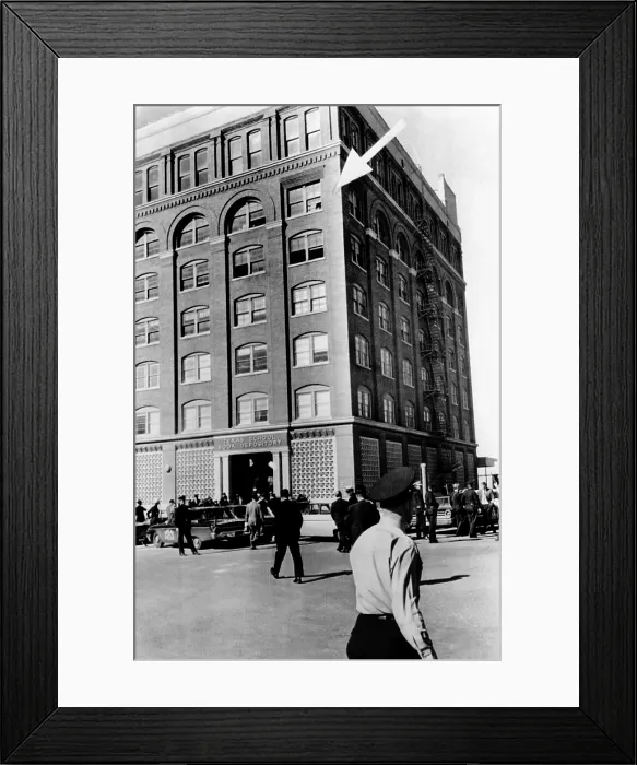 Framed Print : Dealey Plaza, scene of John Kennedy's assassination. Arrow points to window where the assassin fired from to kill President John Kennedy. Nov. 22, 1963 Framed Print : Dealey Plaza, scene of John Kennedy's assassination. Arrow points to window where the assassin fired from to kill President John Kennedy. Nov. 22, 1963