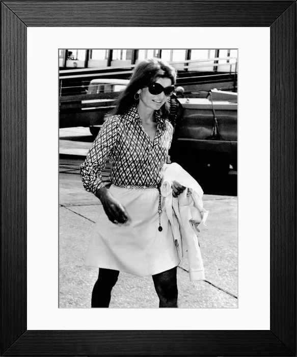 Framed Print : Jacqueline Kennedy Onassis walks through Rome's Leonardo da Vinci Airport. She was traveling from New York to Athens. Aug. 18, 1970