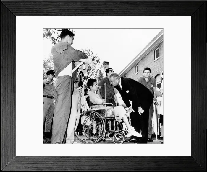 Framed Print : President Lyndon Johnson greets wounded veterans at Walter Reed Hospital. L-R: SSgt. Robert C. Meier; SP / 4 James G. Hartwick; E / 5 Thomas Beil; and SP / 4 James R. Tyree