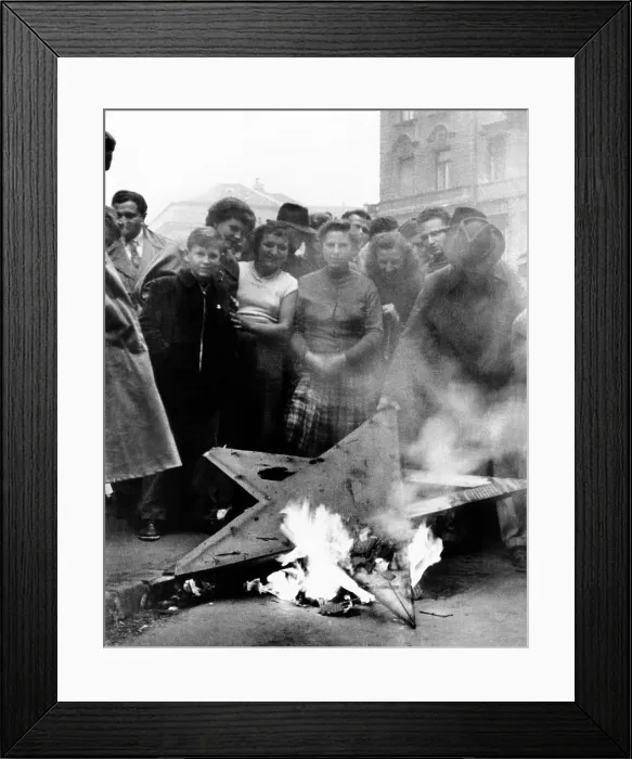 Framed Print : The 1956 Hungarian Uprising. Civilians stand around a destroyed Red Star, a Soviet symbol in University Square. Budapest Hungary. Oct. 23-Nov 4, 1956 Framed Print : The 1956 Hungarian Uprising. Civilians stand around a destroyed Red Star, a Soviet symbol in University Square. Budapest Hungary. Oct. 23-Nov 4, 1956