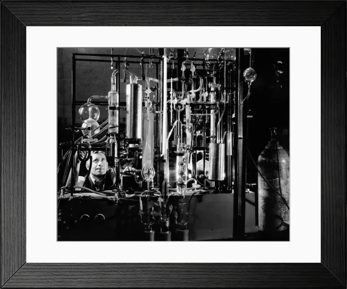 Framed Print : Industrial chemist among glass tubes in a laboratory. Feb. 1943. (CSU_ALPHA_1588) CSU Archives / Everett Collection Framed Print : Industrial chemist among glass tubes in a laboratory. Feb. 1943. (CSU_ALPHA_1588) CSU Archives / Everett Collection