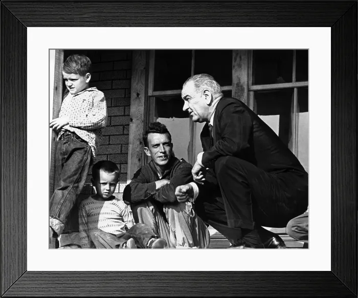 Framed Print : President Lyndon Johnson in conversation the Tom Fletcher family of Inez, Kentucky. The Fletcher family of 8 children earned only $400 last year Framed Print : President Lyndon Johnson in conversation the Tom Fletcher family of Inez, Kentucky. The Fletcher family of 8 children earned only $400 last year