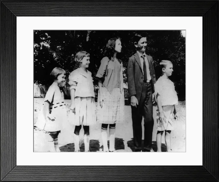 Framed Print : President Lyndon Johnson in an old family photo with his siblings. L-R: Lucia, Joseph, Rebekah, Lyndon in his first long pants, and Sam. Stonewall. Texas. 1921
