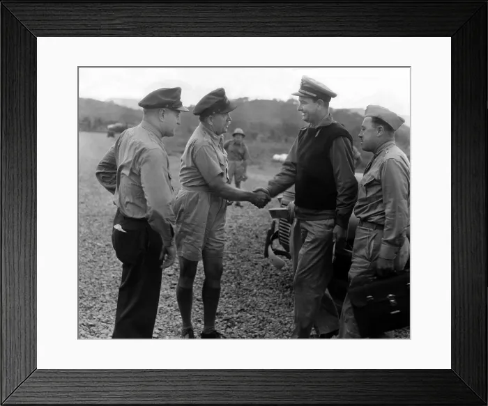 Framed Print : Congressman Lyndon Johnson visiting fighting commanders at an air base in New Guinea Island during World War II. Brig. Gen. Martin Scanlon shakes hands with Lt. Comdr