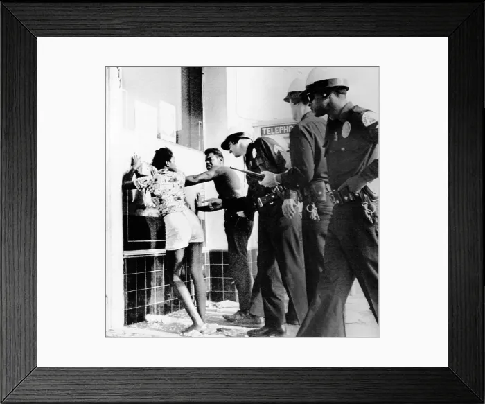 Framed Print : Fifth Day of the 1965 Watts Riots. Police search two African Americans suspected of looting a market. August 15, 1965. (CSU_ALPHA_1727) CSU Archives / Everett Collection Framed Print : Fifth Day of the 1965 Watts Riots. Police search two African Americans suspected of looting a market. August 15, 1965. (CSU_ALPHA_1727) CSU Archives / Everett Collection