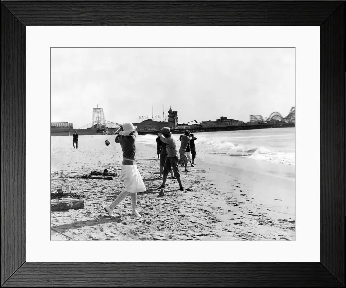 Framed Print : Driving tournament on the beach. Floater golf balls return to the shore, driven by the surf Framed Print : Driving tournament on the beach. Floater golf balls return to the shore, driven by the surf