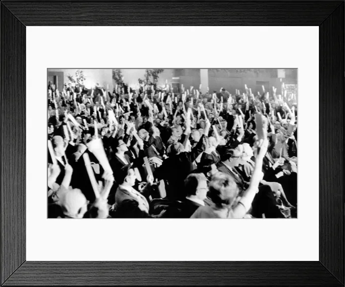 Framed Print : Screen Actors Guild votes to strike. In a near unanimous vote, holding aloft voting cards, they authorize strike action by performers in film and taped television commercials