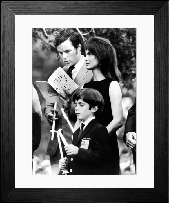 Framed Print : Jacqueline Kennedy Onassis and her son John Kennedy Jr. attend a memorial mass for the late Robert Kennedy on the first anniversary of his assassination