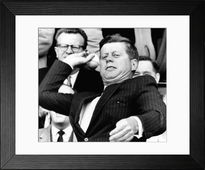 Framed Print : President John Kennedy throws out the first ball of the 1961 baseball season. The President started the game between the Washington Senators and the Chicago White Sox