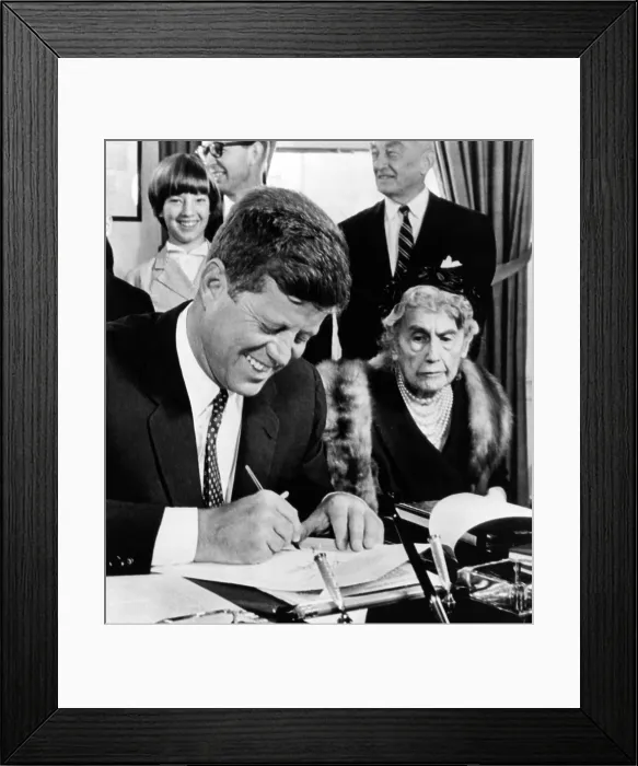 Framed Print : President John Kennedy signs a Joint Resolution for the Woodrow Wilson Memorial Commission. Looking on is 89 year old Edith Bolling Galt Wilson Framed Print : President John Kennedy signs a Joint Resolution for the Woodrow Wilson Memorial Commission. Looking on is 89 year old Edith Bolling Galt Wilson