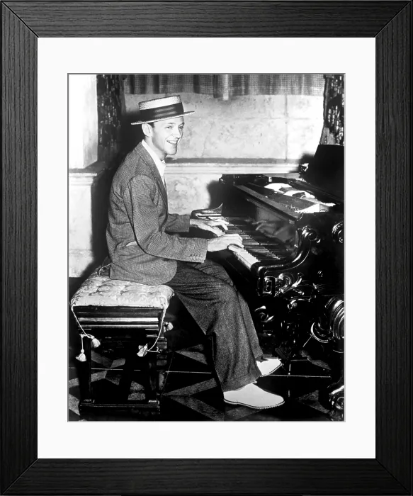 Framed Print : A DAMSEL IN DISTRESS, Fred Astaire at the piano on set, 1937