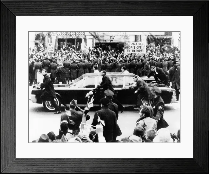 Framed Print : President Richard Nixon's Inauguration. Security guards scramble to protect Nixon's limousine from cans tossed by protesters. Jan. 20, 1969
