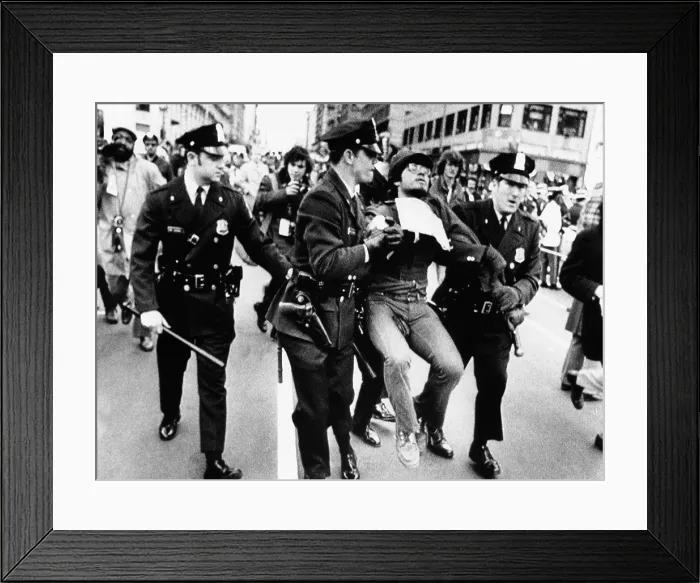 Framed Print : Protester arrested at President Richard Nixon's 1973 Inauguration. Police drag away an antiwar demonstrator from the Inaugural Parade. Jan 20, 1973 Framed Print : Protester arrested at President Richard Nixon's 1973 Inauguration. Police drag away an antiwar demonstrator from the Inaugural Parade. Jan 20, 1973