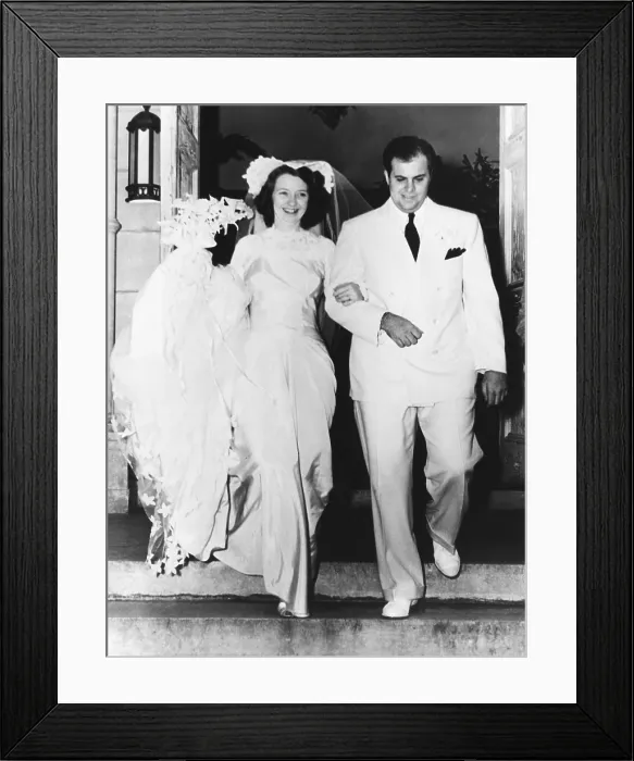 Framed Print : Al Capone's son takes a bride. Mr. and Mrs. Albert Francis Capone, emerging from St. Patrick's Church in Miami Beach after a quiet wedding Framed Print : Al Capone's son takes a bride. Mr. and Mrs. Albert Francis Capone, emerging from St. Patrick's Church in Miami Beach after a quiet wedding