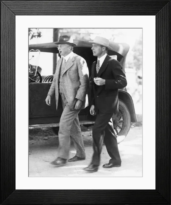 Framed Print : Attorneys William G. Thompson (left) and Herbert Ehrmann, lawyers for Nicola and Vanzetti. They are leaving the Dedham County Court House on Sept