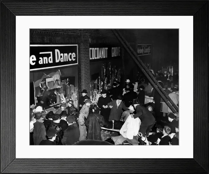 Framed Print : Coconut Grove Nightclub Fire. Firemen, priests, and service men work to remove charred and broken bodies through shattered the windows and doors