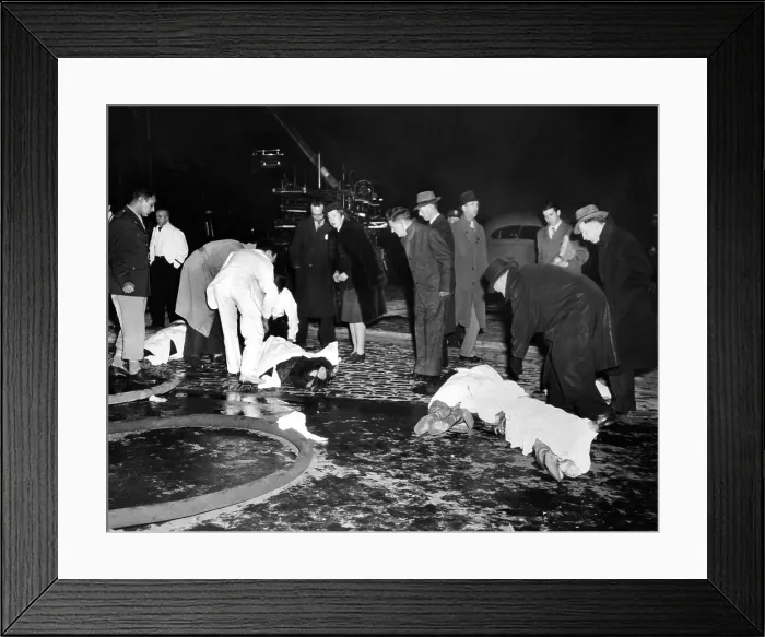 Framed Print : Coconut Grove Nightclub Fire. Four bodies covered with sheets in the street waiting transport to Boston's overwhelmed morgues. Nov. 29, 1942