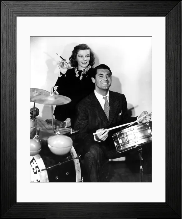 Framed Print : Katharine Hepburn and Cary Grant in a publicity photo from HOLIDAY, 1938