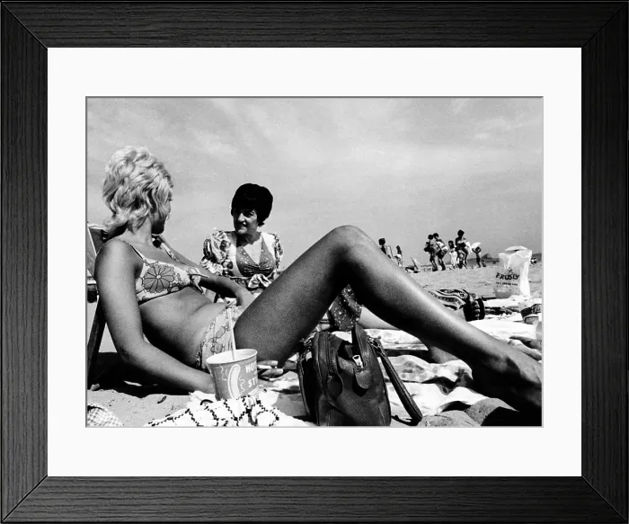 Framed Print : Women sunbathing on the beach in Santa Monica, California. August 1970. (CSU_ALPHA_1702) CSU Archives / Everett Collection