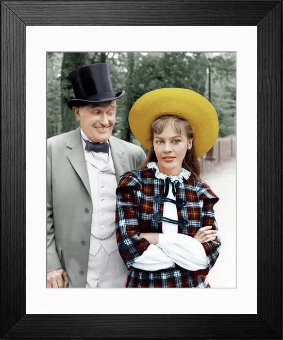 Framed Print : GIGI, from left: Maurice Chevalier, Leslie Caron, 1958