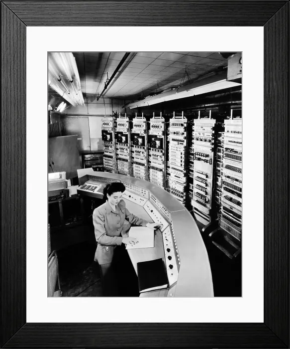 Framed Print : Female operator at the console of the Raydac, Raytheon Digital Automatic Computer. August 2, 1952. (CSU_ALPHA_1386) CSU Archives / Everett Collection Framed Print : Female operator at the console of the Raydac, Raytheon Digital Automatic Computer. August 2, 1952. (CSU_ALPHA_1386) CSU Archives / Everett Collection