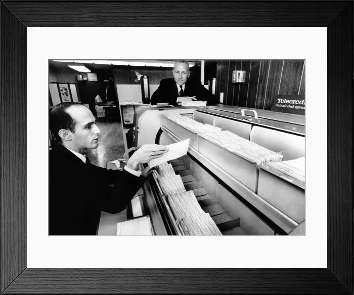 Framed Print : Ron Satz, a 25-year old business school graduate, founded Telecredit, an electronic check approval service
