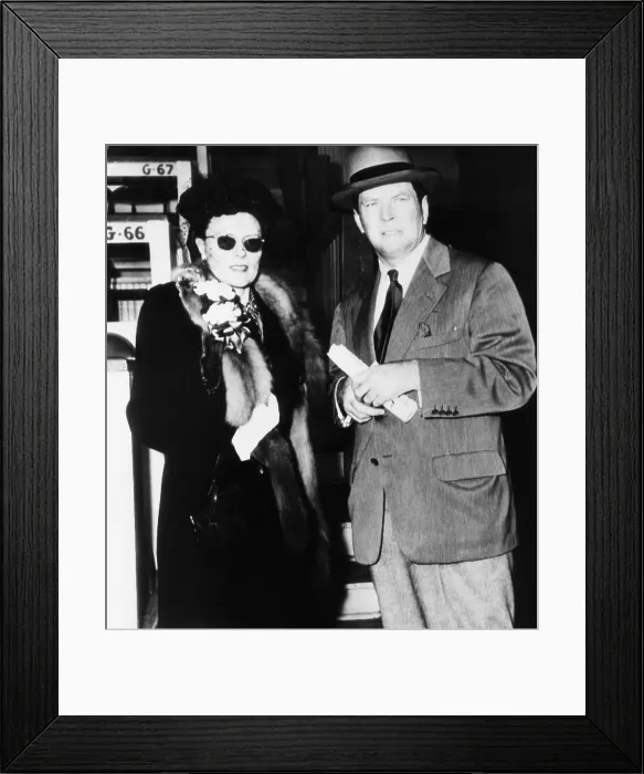 Framed Print : Gene Tunney, and Mrs. Tunney at Churchill Downs for the running of the Kentucky Derby. May 4, 1946 Framed Print : Gene Tunney, and Mrs. Tunney at Churchill Downs for the running of the Kentucky Derby. May 4, 1946
