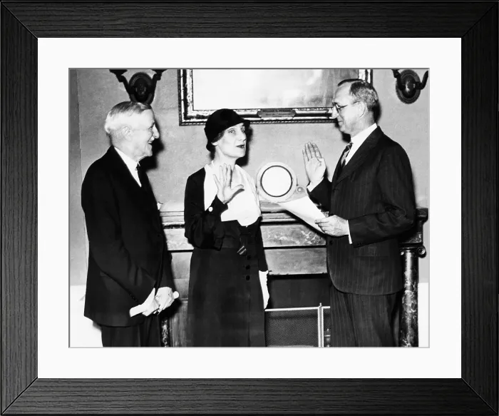 Framed Print : Nellie Tayloe Ross sworn in as Director of the Mint. May 3, 1933. R-L: Secretary of the Treasury Woodin, Mrs. Ross and F.A. Birgfeld, Chief Clerk of the Treasury Department Framed Print : Nellie Tayloe Ross sworn in as Director of the Mint. May 3, 1933. R-L: Secretary of the Treasury Woodin, Mrs. Ross and F.A. Birgfeld, Chief Clerk of the Treasury Department