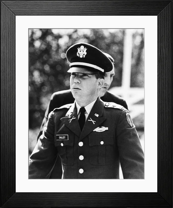 Framed Print : Army Lt. William L. Calley upon arrival at his pre-trial hearing for his forthcoming court-martial. Feb. 9, 1970 Framed Print : Army Lt. William L. Calley upon arrival at his pre-trial hearing for his forthcoming court-martial. Feb. 9, 1970