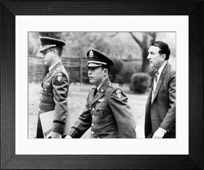 Framed Print : Army Lt. William Calley arriving at his court martial for leading the My Lai massacres. With him are Major Kenneth Raby (left) and Richard Kay of his defense staff. Nov. 19, 1970