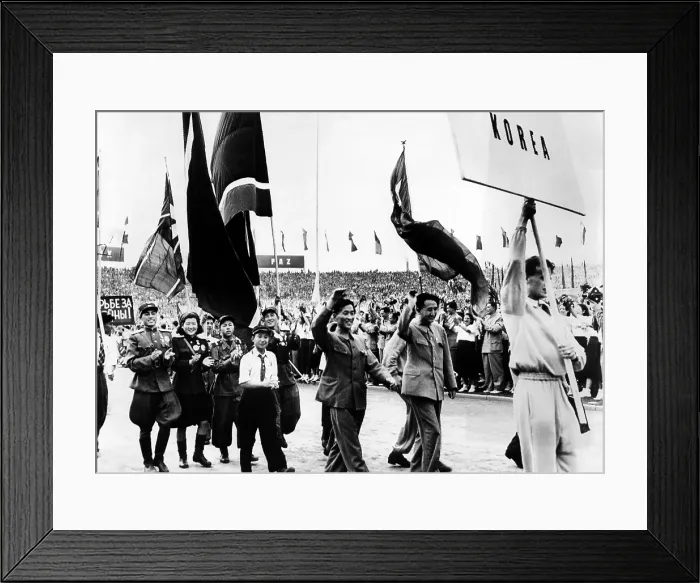 Framed Print : North Korean delegates to the Communist World Youth Festival. Some of the Koreans wear army uniforms and decorations awarded to them in the Korean War against the United Nations
