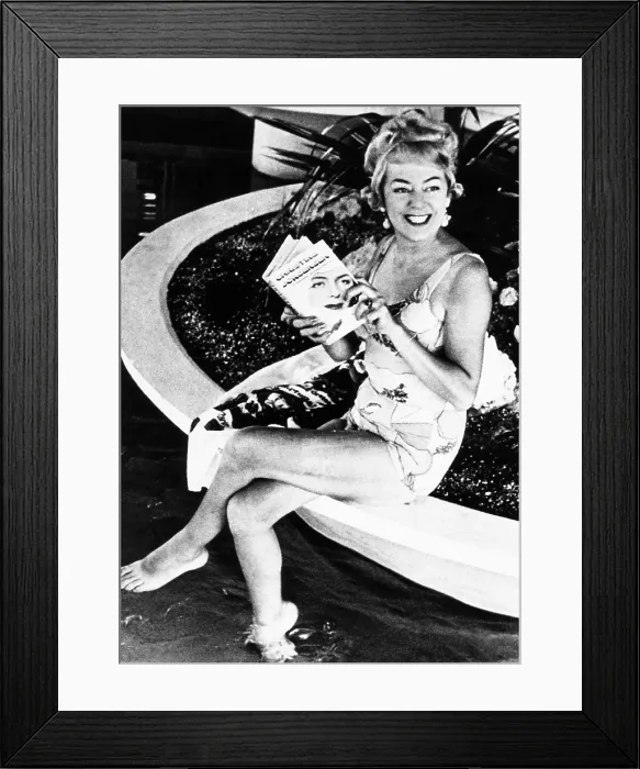 Framed Print : Christine Jorgensen, 47, poses for photographers in a swimsuit. She was promoting Christine Jorgensen: A Personal Autobiography'. Miami Beach, Florida, Aug Framed Print : Christine Jorgensen, 47, poses for photographers in a swimsuit. She was promoting Christine Jorgensen: A Personal Autobiography'. Miami Beach, Florida, Aug