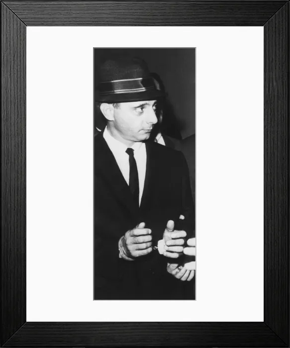 Framed Print : Brooklyn mobster Larry Gallo, leaving Brooklyn federal court in handcuffs. On August 22, 1963 he was sentenced to 18 months in federal prison