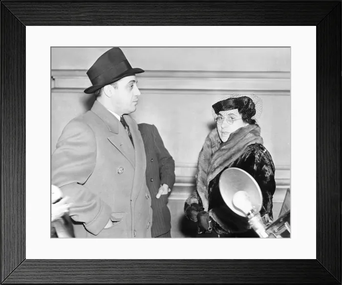 Framed Print : Al Capone's mother Teresa, and brother Ralph photographed in Federal Prison at Terminal Island. Los Angeles. They were there to visit Al Capone on Feb. 27, 1939