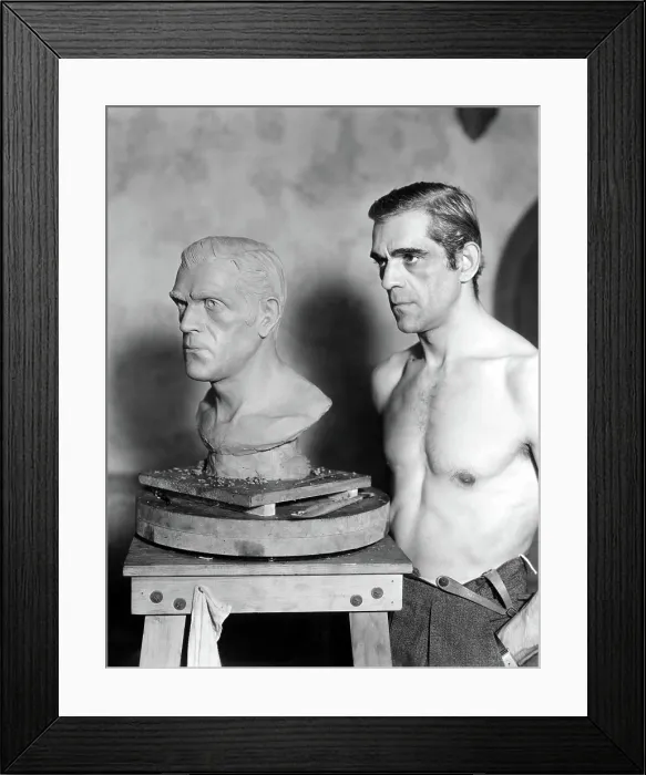 Framed Print : BORIS KARLOFF caught while posing for sculptor Ivan Simpson, 1933