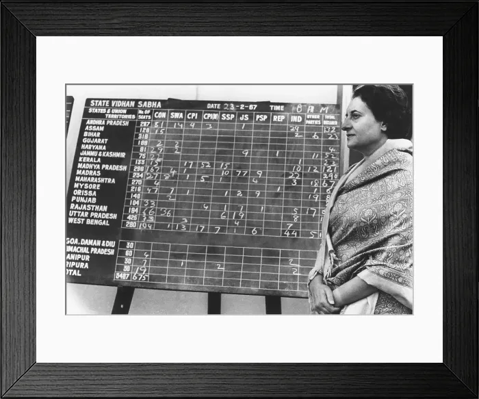 Framed Print : Indian Prime Minister Indira Gandhi beside a bulletin board showing early election returns. Feb. 28, 1967 Framed Print : Indian Prime Minister Indira Gandhi beside a bulletin board showing early election returns. Feb. 28, 1967