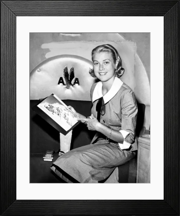 Framed Print : Grace Kelly, returning to Hollywood from the French Riviera, where she has been filming TO CATCH A THIEF, July 1954 Framed Print : Grace Kelly, returning to Hollywood from the French Riviera, where she has been filming TO CATCH A THIEF, July 1954