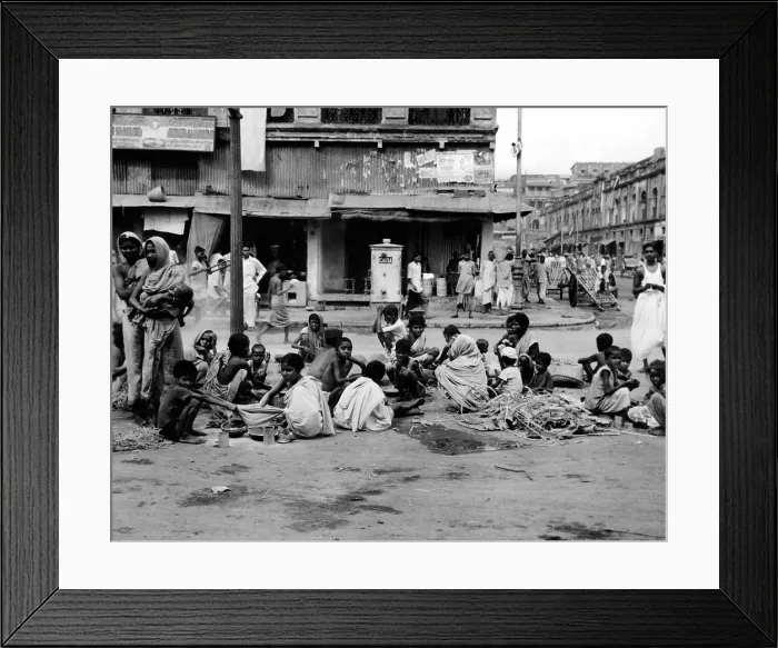 Framed Print : At the peak of India's famine in late October 1943, Starving homeless people huddle in a Calcutta street