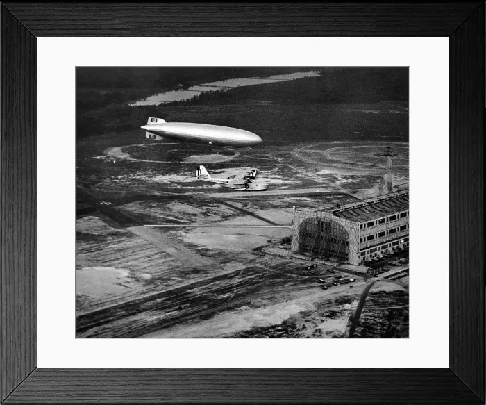 Framed Print : Hindenburg's arrival with an escort plane over Lakehurst, New Jersey. Minutes later it exploded and crashed. May 6, 1937. (CSU_ALPHA_1447) CSU Archives / Everett Collection