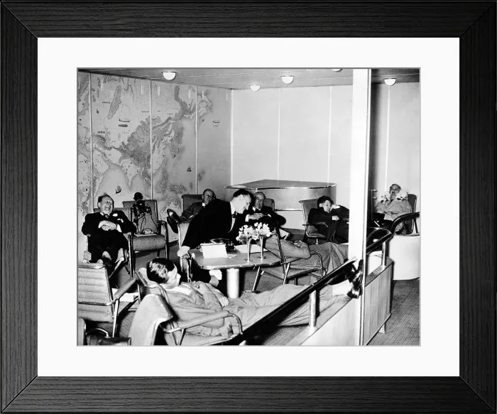 Framed Print : High life on the Hindenburg. Passengers aboard the Hindenburg at ease in the salon as the dirigible flew over the mid-Atlantic, en route to Lakehurst, NJ. May 10, 1936