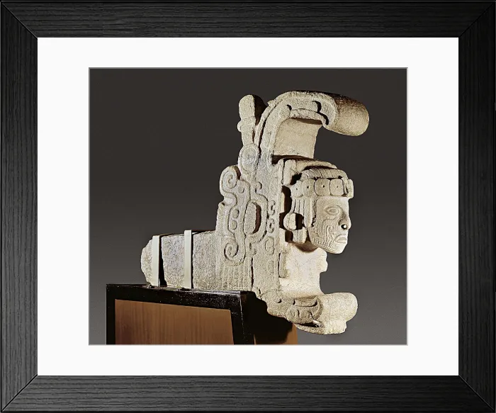 Framed Print : Head of priest or deity emerging from the jaws of a snake. 650-950. Puuc style. Maya art. Sculpture on rock. MEXICO. Mexico City. National Museum of Anthropology. Proc: MEXICO Framed Print : Head of priest or deity emerging from the jaws of a snake. 650-950. Puuc style. Maya art. Sculpture on rock. MEXICO. Mexico City. National Museum of Anthropology. Proc: MEXICO