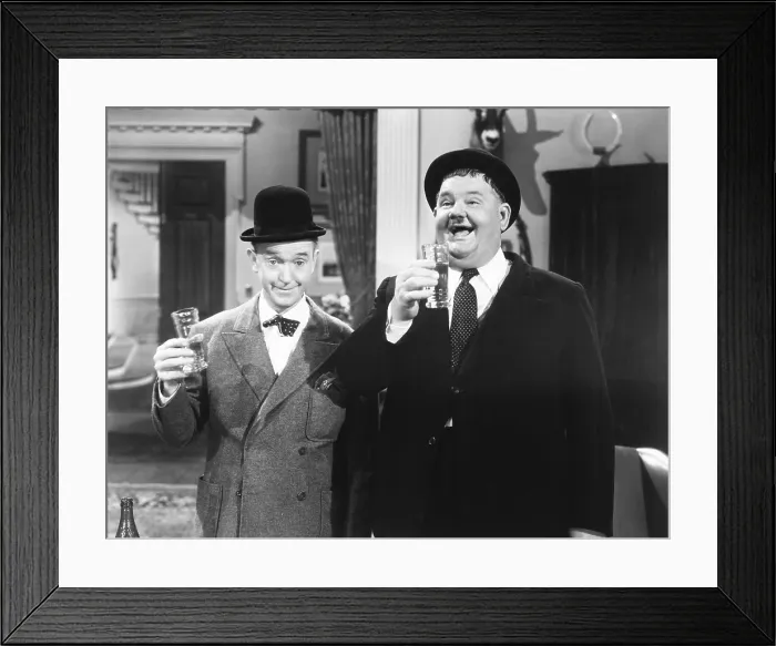 Framed Print : THE DANCING MASTERS, from left: Stan Laurel, Oliver Hardy, 1943. TM & copyright 20th Century Fox Film Corp. All rights reserved / courtesy Everett Collection Framed Print : THE DANCING MASTERS, from left: Stan Laurel, Oliver Hardy, 1943. TM & copyright 20th Century Fox Film Corp. All rights reserved / courtesy Everett Collection