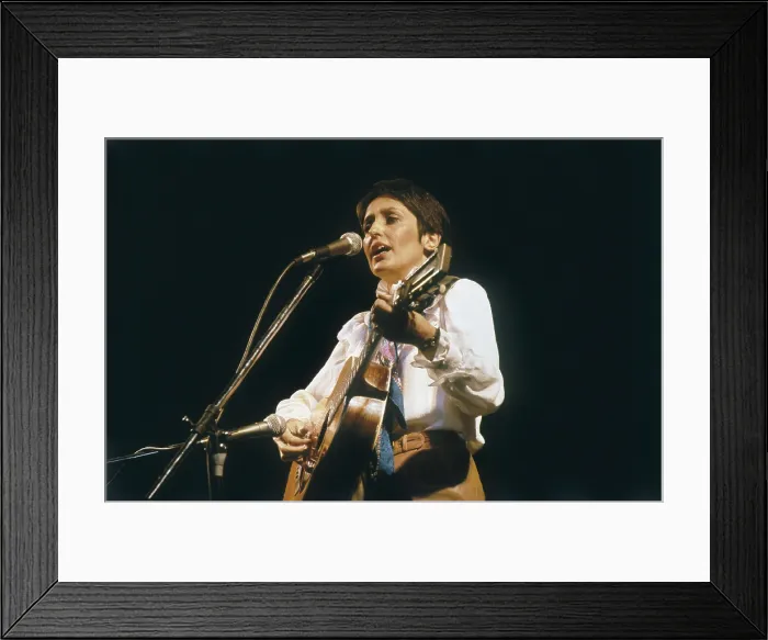 Framed Print : BAEZ, Joan (1941). Joan Baez during a concert in 1983. AISA / Everett Collection**US SALES ONLY**